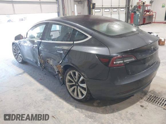 2018 Tesla Model 3 Long Range Battery with VIN 5YJ3E1EB1JF145520, listed as a IAAI auction lot 41360939 with 95,010 mi miles and . Bid and sale history available at DreamBid. Image 3.