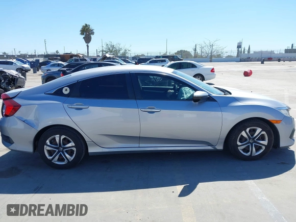 2017 Honda Civic LX z VIN 2HGFC2F5XHH572573, wystawiony jako IAAI lot #41825261 z przebiegiem 83 599 mil mil oraz . Historia ofert i sprzedaży dostępna na DreamBid. Obrazek 13.