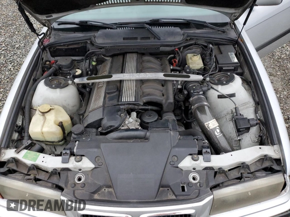 1999 BMW 3 Series 328ic with VIN WBABK7331XET68084, listed as a Copart auction lot 86205884 with 0 mi miles and Salvage Title. Bid and sale history available at carsss.com. Image 13.