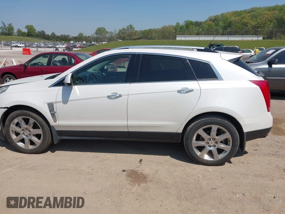 2012 Cadillac SRX Performance Collection z VIN 3GYFNBE39CS628740, wystawiony jako IAAI lot #42063414 z przebiegiem 88 260 mil mil oraz . Historia ofert i sprzedaży dostępna na DreamBid. Obrazek 14.