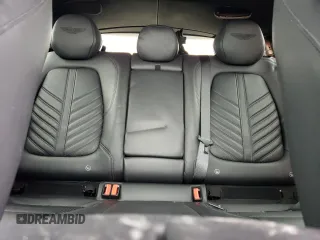 2023 Aston Martin DBX 707 z VIN SD7VUJBW2PTV06486, wystawiony jako Copart lot #55818283 z przebiegiem Nie podano mil oraz . Historia ofert i sprzedaży dostępna na DreamBid. Obrazek 10.