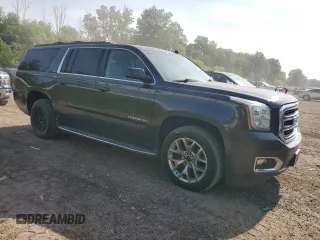 2015 GMC Yukon XL SLT with VIN 1GKS2HKCXFR305300, listed as a Copart auction lot 57120804 with 155,910 mi miles and Clean Title. Bid and sale history available at carsss.com. Image 4.