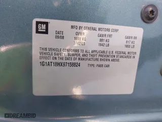 2009 Chevrolet Cobalt LT w/1LT with VIN 1G1AT18HX97158824, listed as a IAAI auction lot 41023261 with 216,949 mi miles. Bid and sale history available at carsss.com. Image 9.
