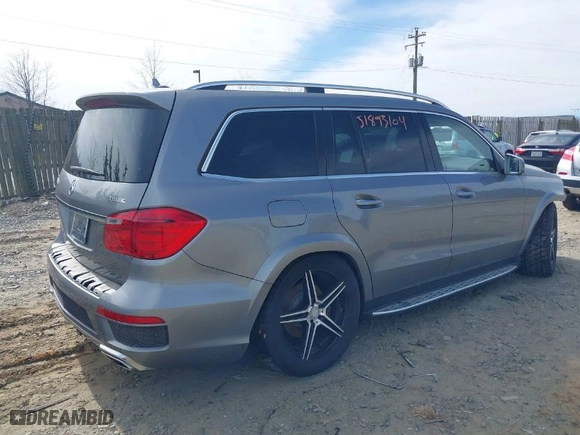 2015 Mercedes-Benz GL-Class GL 550 with VIN 4JGDF7DE2FA488946, listed as a IAAI auction lot 41769097 with 74,414 mi miles. Bid and sale history available at carsss.com. Image 4.