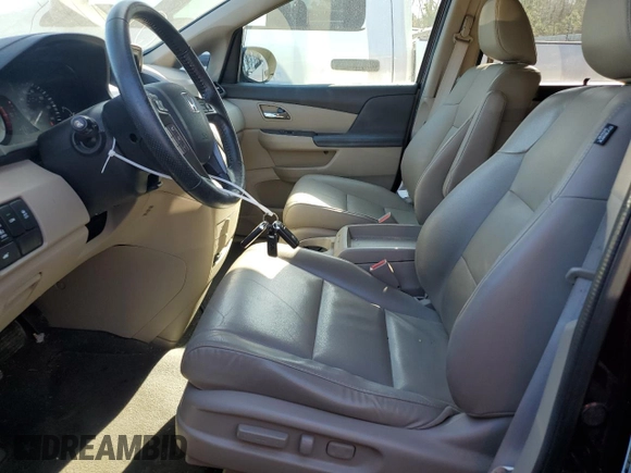 2014 Honda Odyssey EX-L with VIN 5FNRL5H61EB077828, listed as a Copart auction lot 46304125 with 104,367 mi miles and Salvage Title. Bid and sale history available at DreamBid. Image 7.
