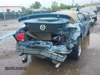 2005 Ford Mustang Deluxe z VIN 1ZVFT84N655195289, wystawiony jako IAAI lot #42182596 z przebiegiem 84 205 mil mil oraz . Historia ofert i sprzedaży dostępna na DreamBid. Obrazek 17.