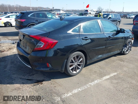 2021 Honda Civic Sedan EX with VIN 19XFC1F32ME206507, listed as a IAAI auction lot 41649684 with 145,491 mi miles. Bid and sale history available at carsss.com. Image 4.