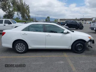 2014 Toyota Camry L with VIN 4T1BF1FK4EU403013, listed as a IAAI auction lot 42115089 with 221,686 mi miles and . Bid and sale history available at DreamBid. Image 13.