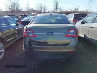 2013 Ford Taurus SEL with VIN 1FAHP2H82DG202314, listed as a IAAI auction lot 41673470 with 273,627 mi miles and . Bid and sale history available at DreamBid. Image 16.