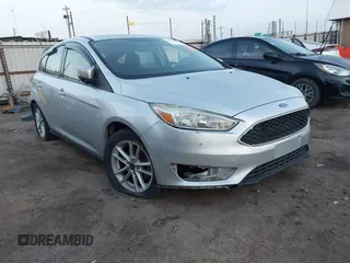 2015 Ford Focus SE with VIN 1FADP3K22FL282457, listed as a IAAI auction lot 41872989 with 98,590 mi miles. Bid and sale history available at carsss.com. Image 1.