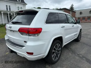 2018 Jeep Grand Cherokee Overland with VIN 1C4RJFCG8JC505915, listed as a Copart auction lot 58612095 with 112,817 mi miles and Clean title. Bid and sale history available at DreamBid. Image 4.