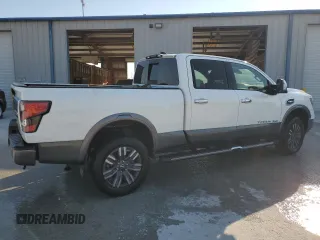 2023 Nissan Titan XD PRO-4X with VIN 1N6AA1FB1PN109108, listed as a Copart auction lot 71021034 with 15,828 mi miles and Salvage Title. Bid and sale history available at carsss.com. Image 3.