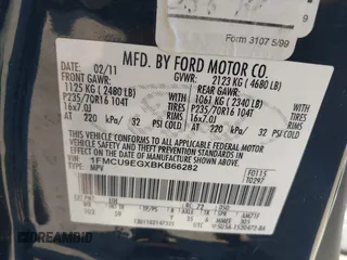 2011 Ford Escape Limited with VIN 1FMCU9EGXBKB66282, listed as a IAAI auction lot 42177063 with 244,515 mi miles. Bid and sale history available at carsss.com. Image 9.