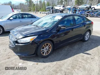 2016 Ford Focus SE with VIN 1FADP3F24GL248175, listed as a IAAI auction lot 41867019 with 135,471 mi miles. Bid and sale history available at carsss.com. Image 2.