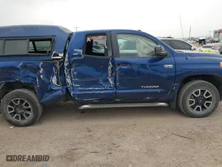 2014 Toyota Tundra 4WD Truck SR with VIN 5TFUY5F1XEX352184, listed as a IAAI auction lot 40732632 with 107,262 mi miles. Bid and sale history available at carsss.com. Image 14.