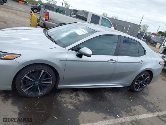 2018 Toyota Camry LE with VIN 4T1B11HK0JU129623, listed as a IAAI auction lot 41902335 with 100,643 mi miles. Bid and sale history available at carsss.com. Image 14.