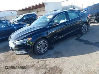 2017 Ford Fusion Energi SE with VIN 3FA6P0PU0HR129792, listed as a IAAI auction lot 41104376 with 86,659 mi miles. Bid and sale history available at carsss.com. Image 17.