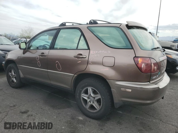 1999 Lexus RX 300 with VIN JT6HF10U1X0071946, listed as a Copart auction lot 53566055 with 133,138 mi miles and Salvage Title. Bid and sale history available at DreamBid. Image 2.