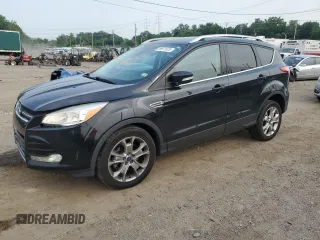 2015 Ford Escape Titanium with VIN 1FMCU0J9XFUA42557, listed as a Copart auction lot 59671875 with 125,756 mi miles and Salvage title. Bid and sale history available at DreamBid. Image 1.