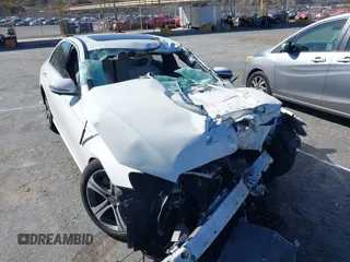 2019 Mercedes-Benz E 300 with VIN WDDZF4JB8KA505980, listed as a IAAI auction lot 41611693 with Not Provided miles and . Bid and sale history available at DreamBid. Image 6.
