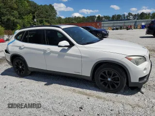 2014 BMW X1 xDrive28i z VIN WBAVL1C57EVY10873, wystawiony jako Copart lot #57914375 z przebiegiem 114 153 mil mil oraz Szkody całkowita. Historia ofert i sprzedaży dostępna na DreamBid. Obrazek 4.