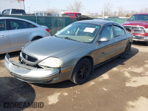 2003 Mercury Sable GS z VIN 1MEFM50243A619761, wystawiony jako IAAI lot #41790150 z przebiegiem 114 522 mil mil oraz . Historia ofert i sprzedaży dostępna na DreamBid. Obrazek 17.