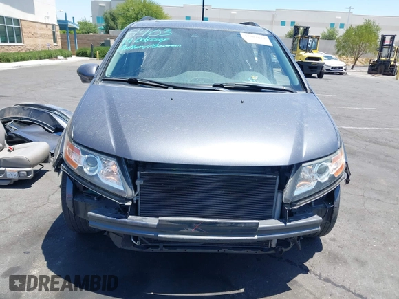 2014 Honda Odyssey EX-L z VIN 5FNRL5H61EB041962, wystawiony jako IAAI lot #42282873 z przebiegiem 134 884 mil mil oraz . Historia ofert i sprzedaży dostępna na DreamBid. Obrazek 13.