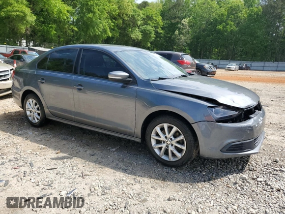 2011 Volkswagen Jetta SE with VIN 3VWDX7AJ2BM361210, listed as a Copart auction lot 53984825 with 223,915 mi miles and Salvage title. Bid and sale history available at DreamBid. Image 4.