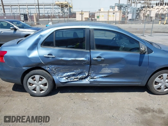 2008 Toyota Yaris with VIN JTDBT923X81280432, listed as a IAAI auction lot 41997963 with 201,013 mi miles. Bid and sale history available at carsss.com. Image 6.