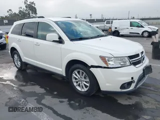 2015 Dodge Journey SXT with VIN 3C4PDDBG9FT600712, listed as a IAAI auction lot 42090741 with 111,741 mi miles and . Bid and sale history available at DreamBid. Image 1.
