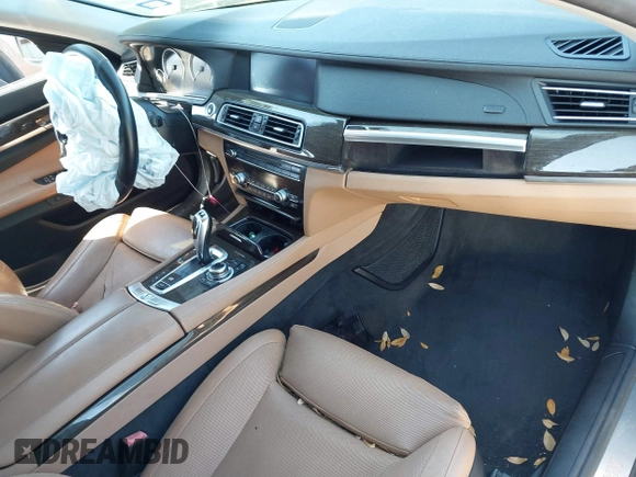 2012 BMW 7 Series 750Li xDrive with VIN WBAKC8C53CC435553, listed as a IAAI auction lot 41852097 with 127,418 mi miles and . Bid and sale history available at DreamBid. Image 5.