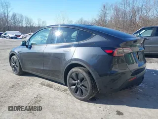 2025 Tesla Model Y Long Range with VIN 7SAYGDED0SF256230, listed as a IAAI auction lot 41356520 with 262 mi miles and . Bid and sale history available at DreamBid. Image 3.