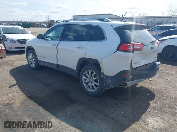 2015 Jeep Cherokee Limited with VIN 1C4PJMDS7FW522581, listed as a IAAI auction lot 41870516 with 143,904 mi miles and . Bid and sale history available at DreamBid. Image 3.