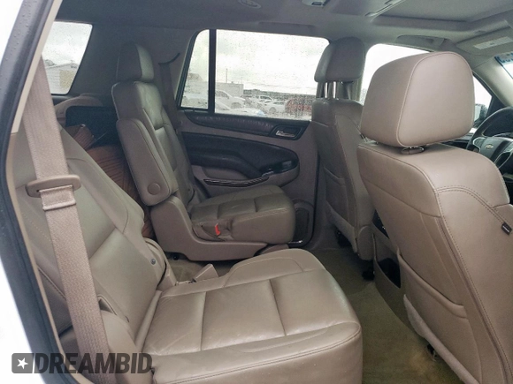 2016 Chevrolet Tahoe LT with VIN 1GNSCBKC2GR475679, listed as a Copart auction lot 54987195 with 130,387 mi miles and Salvage title. Bid and sale history available at DreamBid. Image 11.