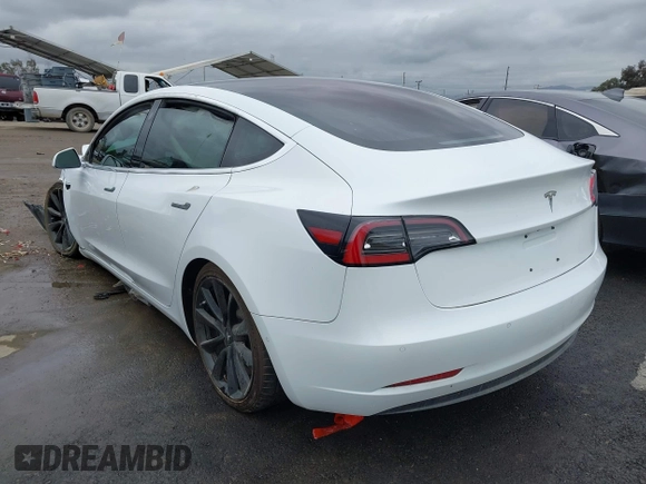 2018 Tesla Model 3 Long Range Battery with VIN 5YJ3E1EA1JF038751, listed as a IAAI auction lot 40553966 with 95,753 mi miles and . Bid and sale history available at DreamBid. Image 3.