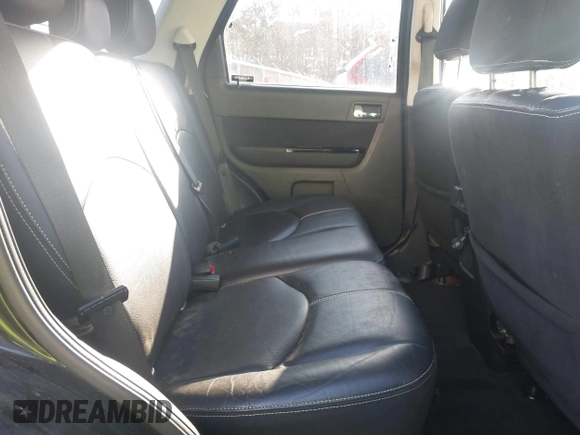 2010 Mazda Tribute Sport with VIN 4F2CY9C74AKM03679, listed as a IAAI auction lot 41740156 with 142,208 mi miles and . Bid and sale history available at DreamBid. Image 8.