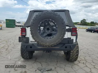 2015 Jeep Wrangler Unlimited Sport с VIN 1C4BJWDG3FL570131, выставлен на аукционе Copart как лот 64418415 с пробегом 112 362 миль миль и Списание • Salvage title. История ставок и продаж доступна на DreamBid. Изображение 6.