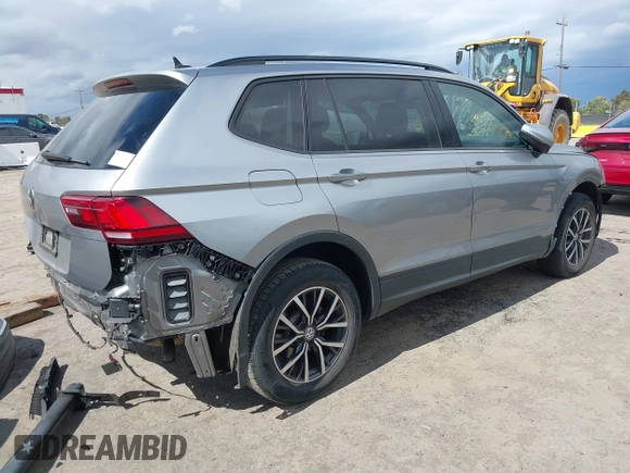 2021 Volkswagen Tiguan S with VIN 3VV1B7AX1MM070775, listed as a IAAI auction lot 41788112 with 22,107 mi miles and . Bid and sale history available at DreamBid. Image 4.