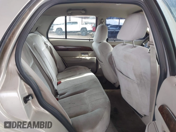 2006 Mercury Grand Marquis GS z VIN 2MEFM74VX6X638763, wystawiony jako IAAI lot #41735612 z przebiegiem 123 914 mil mil oraz . Historia ofert i sprzedaży dostępna na DreamBid. Obrazek 8.