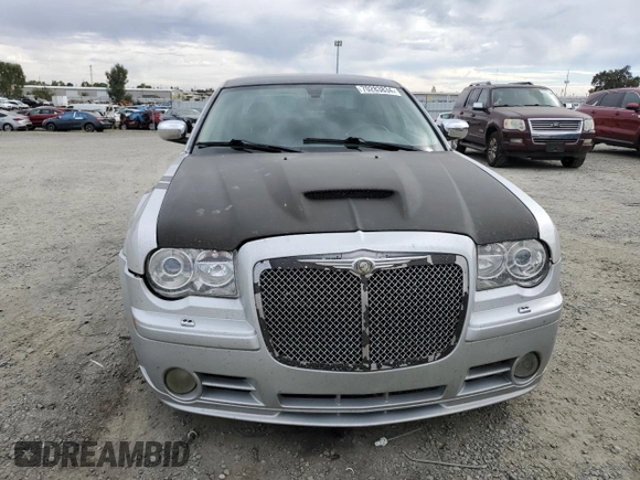 2007 Chrysler 300 C SRT8 with VIN 2C3LA73W07H660214, listed as a Copart auction lot 70283834 with 249,130 mi miles and Salvage Title. Bid and sale history available at carsss.com. Image 5.