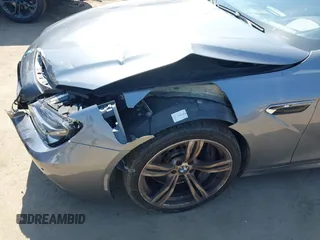 2013 BMW M6 with VIN WBSLX9C51DC968593, listed as a IAAI auction lot 42465979 with 88,010 mi miles and . Bid and sale history available at DreamBid. Image 18.