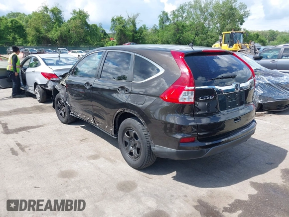 2015 Honda CR-V LX with VIN 2HKRM4H38FH601802, listed as a IAAI auction lot 42177101 with 71,775 mi miles and . Bid and sale history available at DreamBid. Image 3.