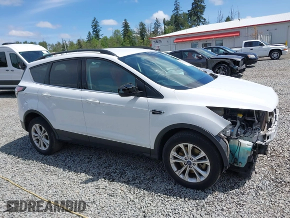 2018 Ford Escape SE z VIN 1FMCU9GD6JUB45046, wystawiony jako IAAI lot #42314262 z przebiegiem 107 962 mil mil oraz . Historia ofert i sprzedaży dostępna na DreamBid. Obrazek 14.