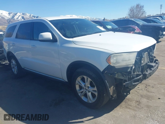 2013 Dodge Durango Special Service with VIN 1C4SDJFT8DC658044, listed as a IAAI auction lot 41871863 with 214,545 mi miles and . Bid and sale history available at carsss.com. Image 1.