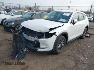 2020 Mazda CX-5 Sport with VIN JM3KFABM5L0762930, listed as a IAAI auction lot 41687180 with 35,507 mi miles. Bid and sale history available at carsss.com. Image 2.