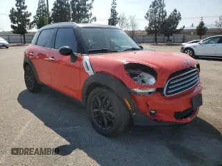 2012 MINI Countryman with VIN WMWZB3C59CWM06478, listed as a Copart auction lot 62547305 with 84,008 mi miles and Salvage title. Bid and sale history available at DreamBid. Image 4.