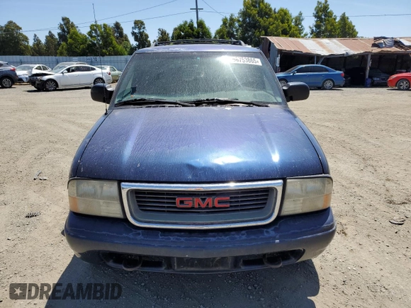2001 GMC Jimmy SLE Rental Fleet z VIN 1GKDT13W212108144, wystawiony jako Copart lot #58753865 z przebiegiem 254 402 mil mil oraz Szkoda całkowita • Salvage title. Historia ofert i sprzedaży dostępna na DreamBid. Obrazek 5.
