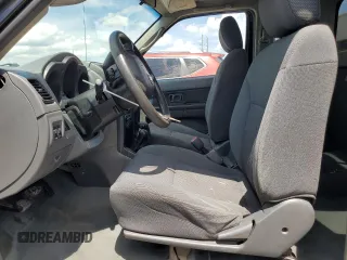 2004 Nissan Frontier XE Desert Runner with VIN 1N6ED26Y04C428073, listed as a Copart auction lot 63852965 with 237,327 mi miles and Clean title. Bid and sale history available at DreamBid. Image 7.