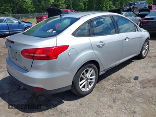 2016 Ford Focus SE z VIN 1FADP3F28GL365676, wystawiony jako IAAI lot #42221665 z przebiegiem 54 899 mil mil oraz . Historia ofert i sprzedaży dostępna na DreamBid. Obrazek 4.
