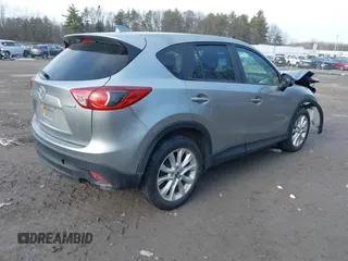 2013 Mazda CX-5 Grand Touring with VIN JM3KE4DE2D0115154, listed as a IAAI auction lot 41706007 with 153,532 mi miles. Bid and sale history available at carsss.com. Image 4.